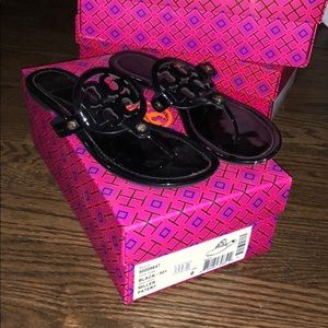 Tory Burch black and gold sandals